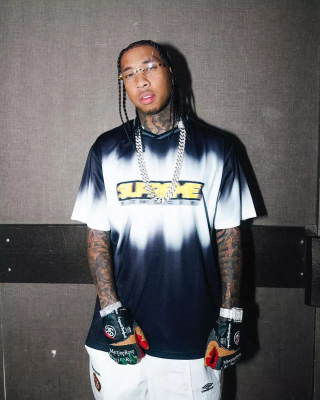 Supreme x Umbro White 'World Famous Team' Trackpants worn by Tyga on the Instagram account @tyga