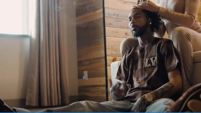 Botas Louis Vuitton Brown Shearling 'LV Footprint' usadas por Key Glock en Key Glock - F**k Around & Find Out (Video oficial)