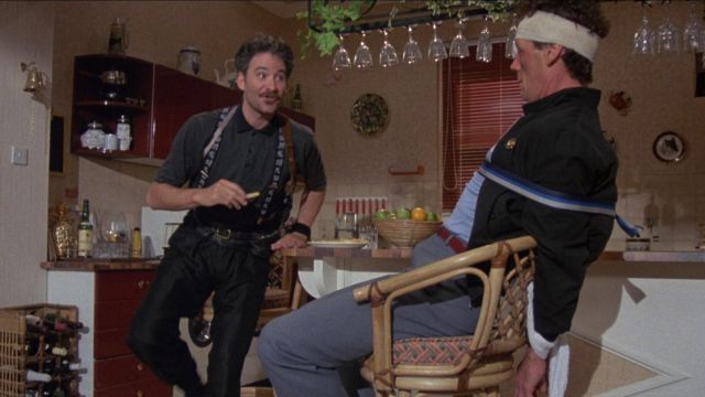 The authentic belt to the shoulder straps of Otto (Kevin Kline) in A fish called Wanda