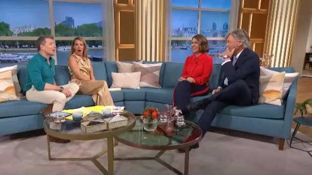 Mint Velvet Gold Satin Pleated Wide Trousers worn by Cat Deeley as seen in This Morning on  29 April,2024