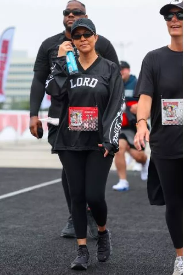 Balenciaga Thin Rectangular Sunglasses worn by  Kourtney Kardashian at Run Travis Run 5K Marathon on July 6, 2024