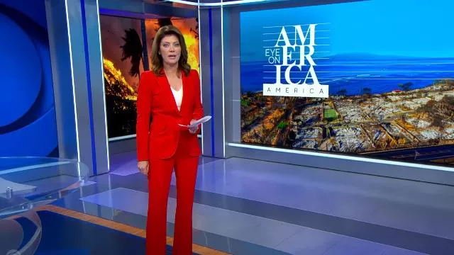 Alexander McQueen Mid-Rise Flared Pants worn by Norah O'Donnell as seen in CBS Evening News on July 31, 2024