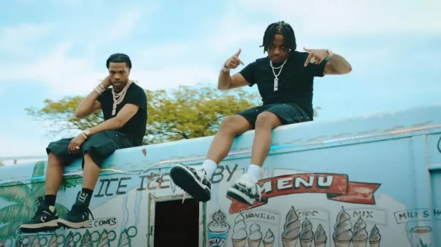 Louis Vuitton White & Black Monogram Denim LV Trainer Maxi Sneakers worn by Tay B in Tay B x Lil Baby - ALL TEN (Official Music Video)