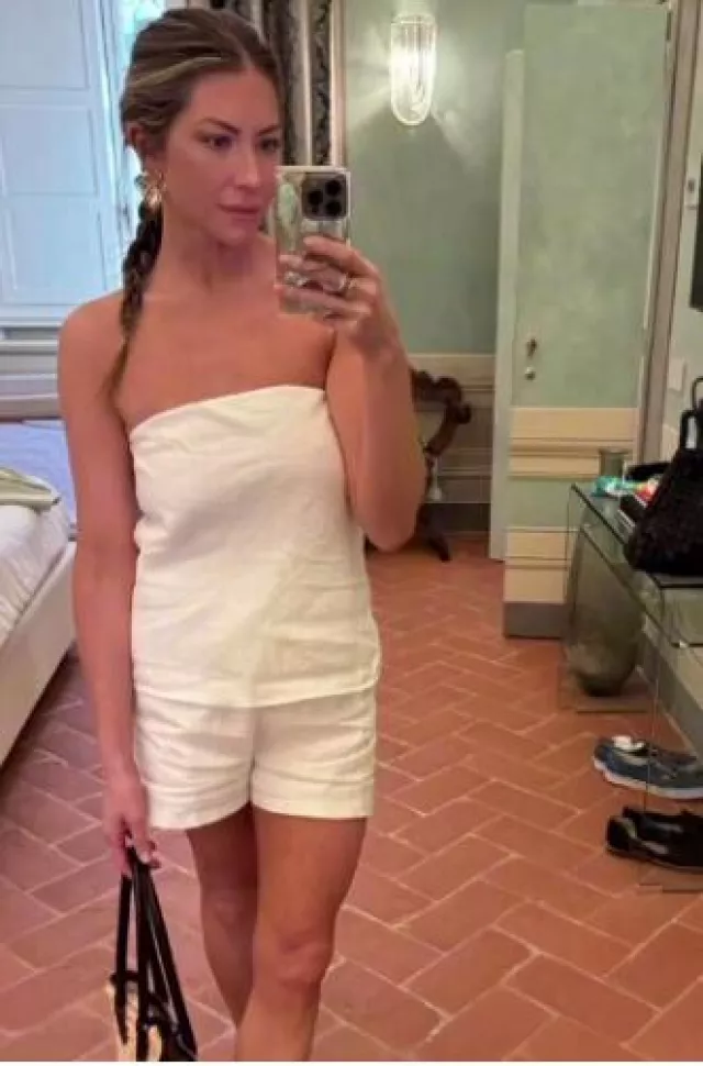 Donni. The Linen Pleated Shorts worn by Stassi Schroeder on her Instagram Post on August 6, 2024