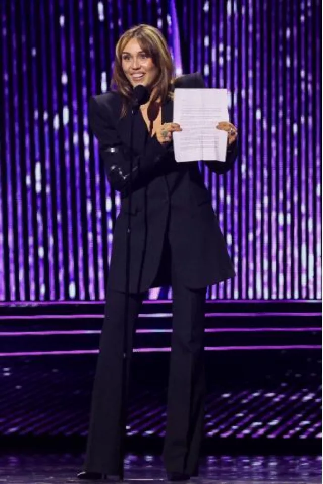 Alexander McQueen Tailored Bootcut Trousers worn by Miley Cyrus at Disney Legends Awards on August 11, 2024