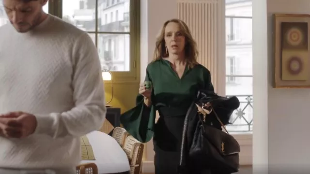 Saint Laurent Large Calypso Chain Bag in Nero worn by Sylvie Grateau (Philippine Leroy-Beaulieu) as seen in Emily in Paris (S04E02)