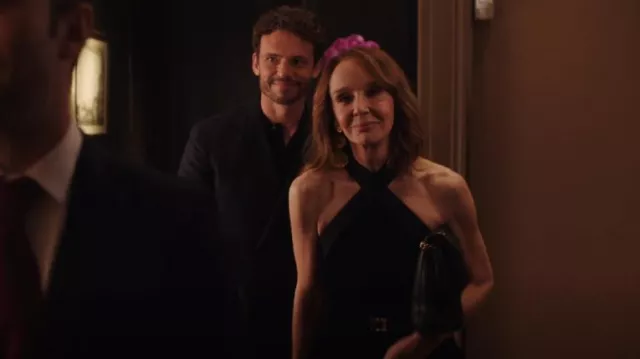 Saint Laurent Crossover Open-Back Halter Bodysuit worn by Sylvie Grateau (Philippine Leroy-Beaulieu) as seen in Emily in Paris (S04E05)