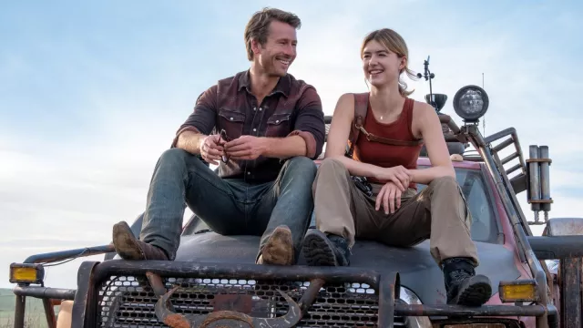 Twisters Movie Outfits: Tyler Owens (Glen Powell) is wearing Brown shirt