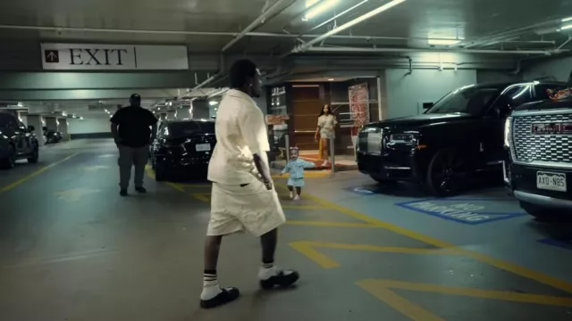 Amiri White, Black & Beige Logo Stripe Socks worn by Kodak Black in Kodak Black - Sharp Vibes [Official Music Video]