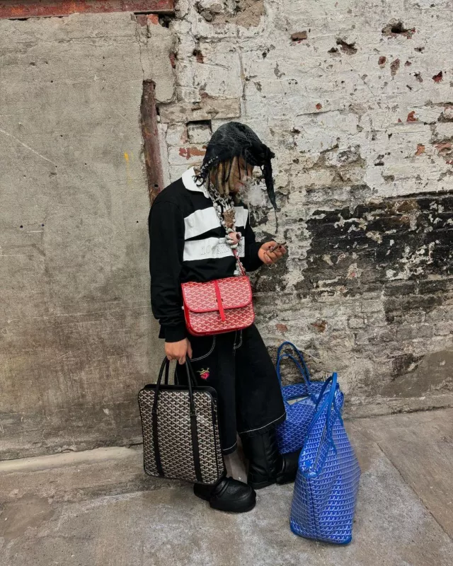 Goyard Red Belvedere MM Messenger Bag worn by Trippie Redd on the Instagram account @trippieredd