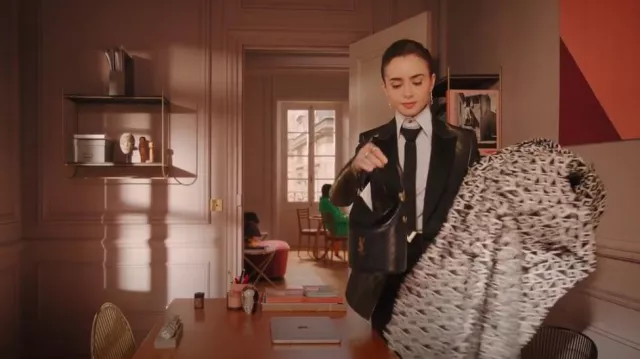 Saint Laurent Gaby Bucket Bag In Lambskin worn by Emily Cooper (Lily Collins) as seen in Emily in Paris (S04E08)