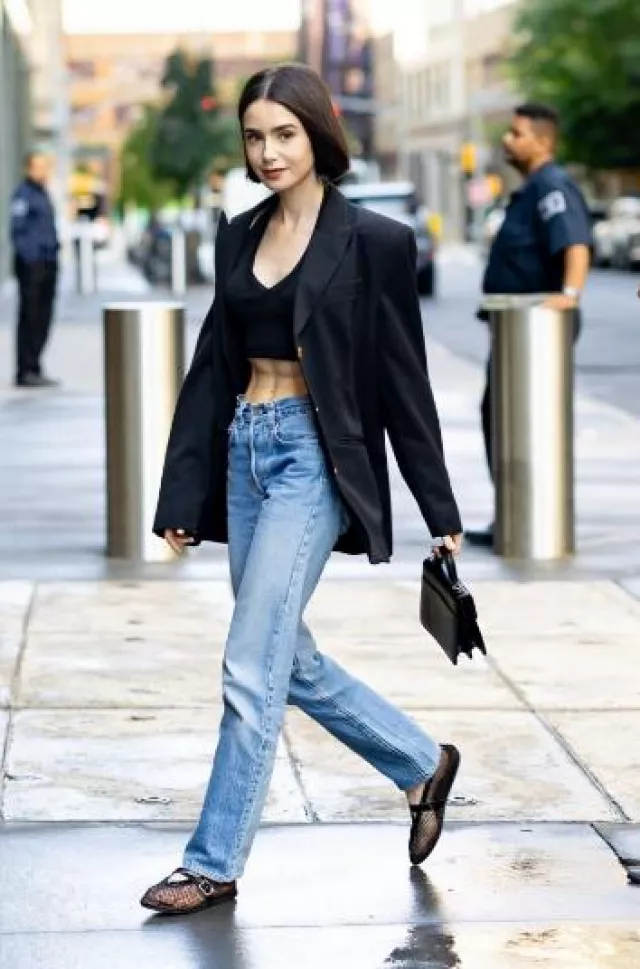 Cartier Top Handle Mini Bag worn by Lily Collins in New York City on September 16, 2024