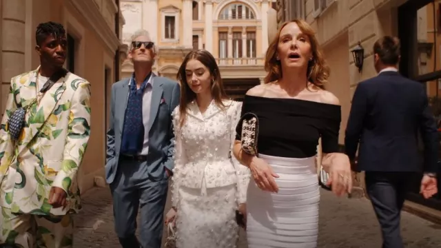 Barbara Bui Off-Shoulder Knitted Top worn by Sylvie Grateau (Philippine Leroy-Beaulieu) as seen in Emily in Paris (S04E10)