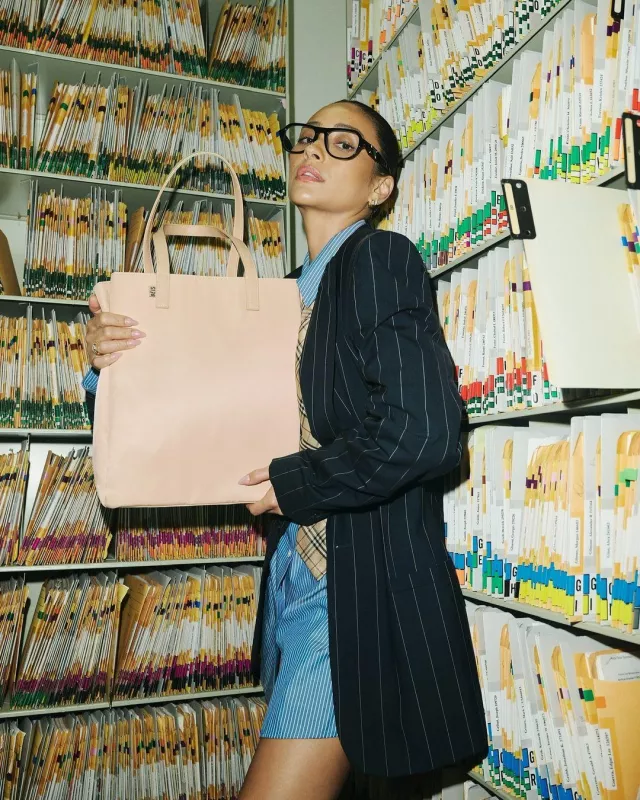 Beis The Commuter Tote in Beige worn by Shay Mitchell on her Instagram on September 18, 2024