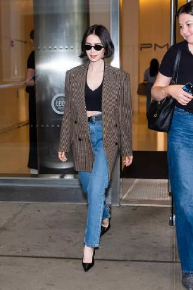 Saint Laurent Sl 751 Jeanne Sunglasses worn by Lily Collins in New York City on September 19, 2024