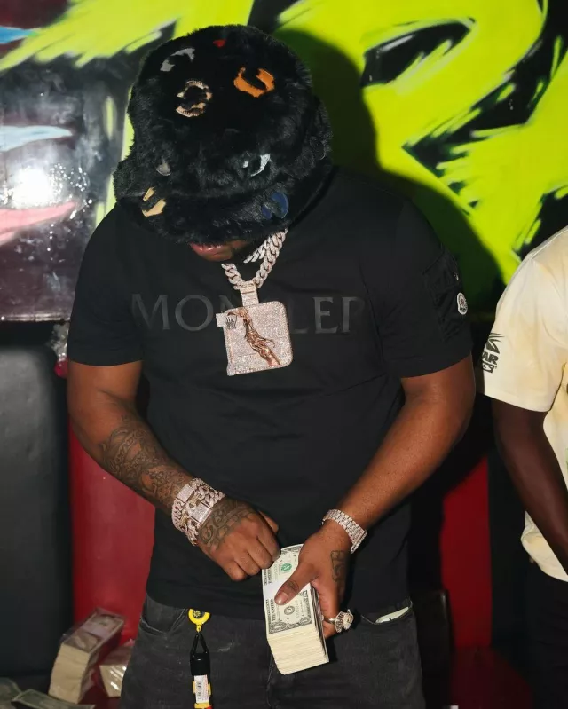 Gallery Dept. Black Faux Fur G Patch Bucket Hat worn by BossMan Dlow on the Instagram account @bossman_dlow