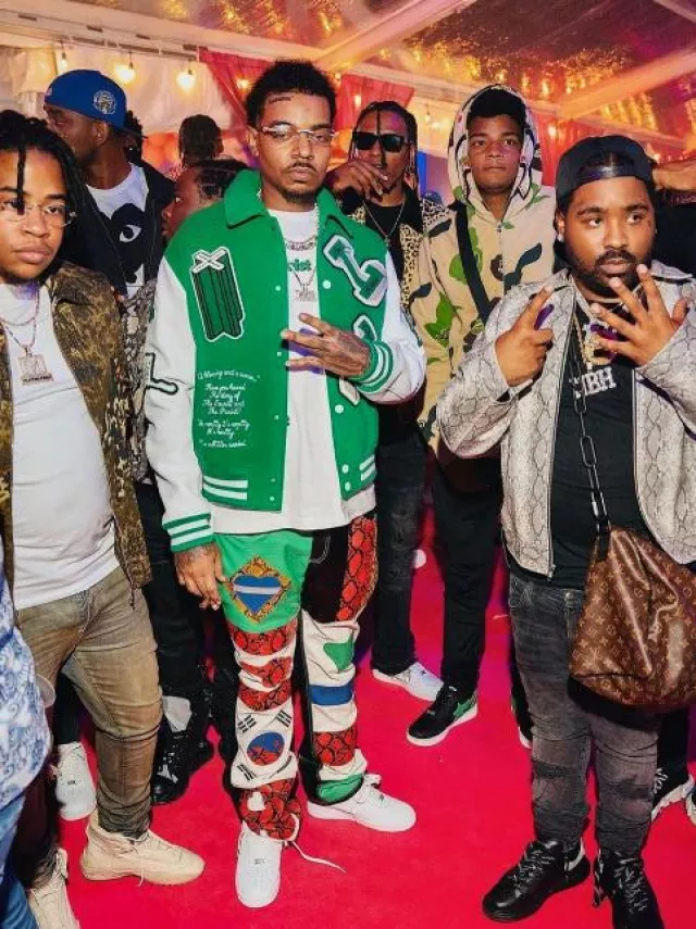 Louis Vuitton White Tourist vs Purist T Shirt worn by Wheezy on the Instagram account @wheezy