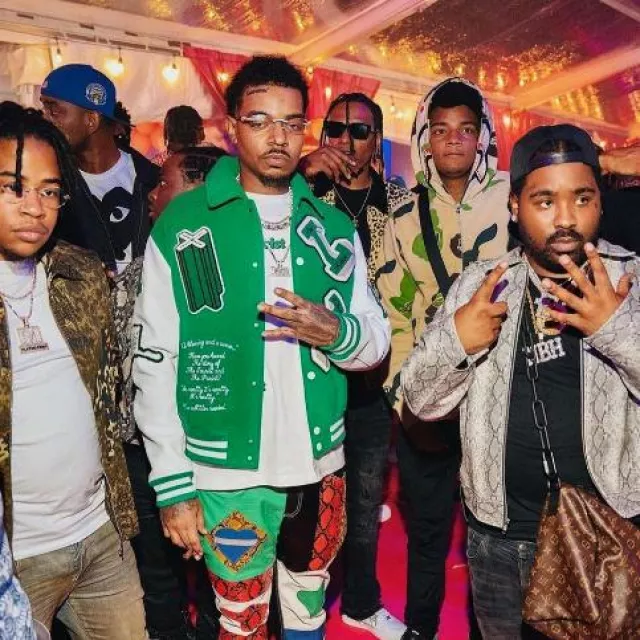 Louis Vuitton Green & White Skeleton Varsity Jacket worn by Wheezy on the Instagram account @wheezy