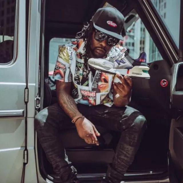 Off White Black Split Oval Logo Hat worn by Wale on the Instagram account @wale