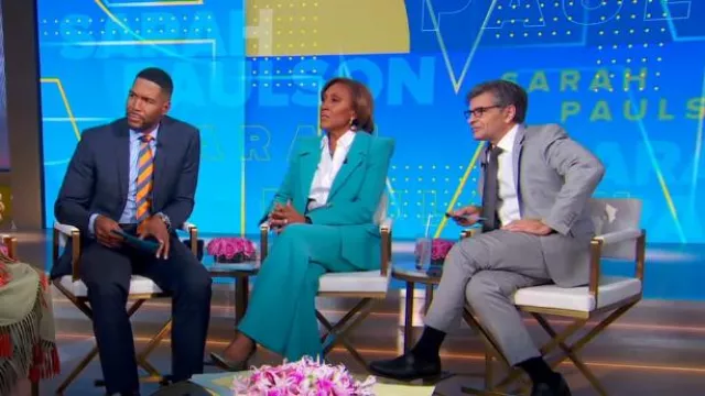 Sergio Hudson Highwaisted Flared Trouser in Turquoise worn by Robin Roberts as seen in Good Morning America on October 3, 2024