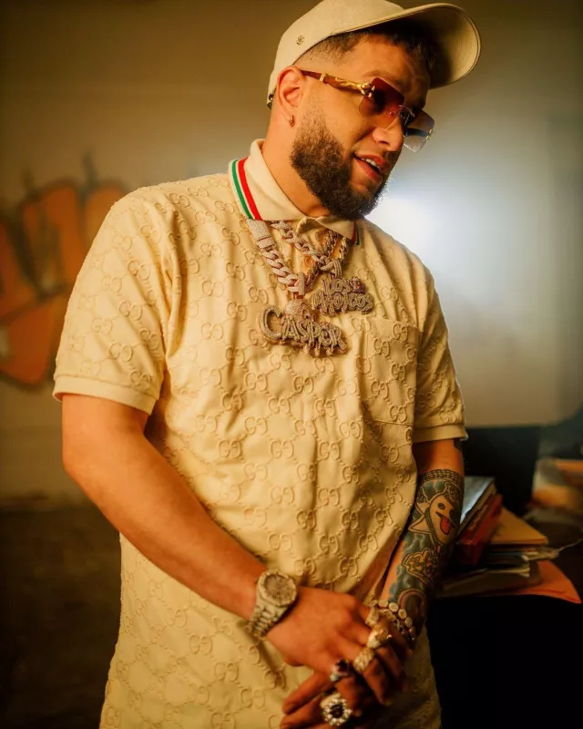 Gucci Light Beige GG-Embroidered Polo worn by Casper Mágico on the Instagram account @casper_magico