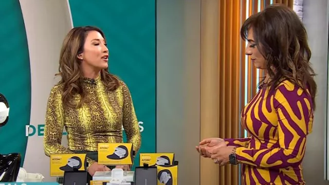 Fore Snake Print Stretch Mock-Neck Long-Sleeve Top worn by Courtney Cason as seen in CBS Mornings on October 12, 2024