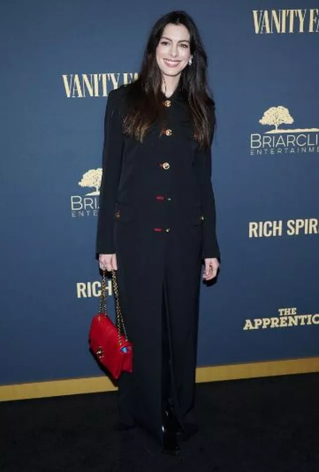 Versace Wool Gabardine Long Uniform Coat worn by Anne Hathaway at The Apprentice Premiere on October 8, 2024