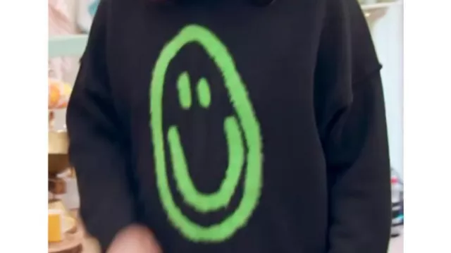 Noel Fielding is wearing Smile Knit Sweater by Lazy Oaf in The Great British Bake Off season 8