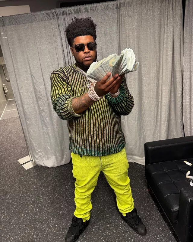 Diesel Black & Neon Gradient Ribbed Sweater worn by BossMan Dlow on the Instagram account @bossman_dlow