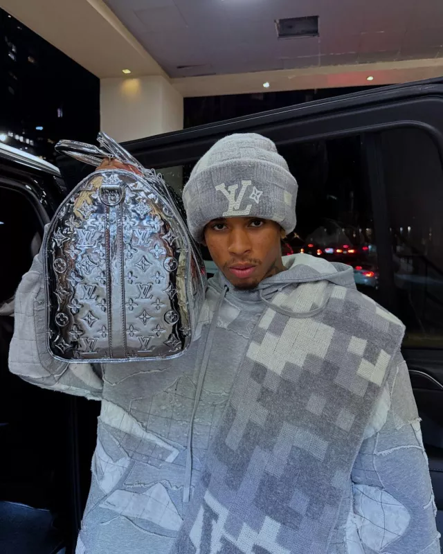 Louis Vuitton Grey Damier Camo Beanie worn by NLE Choppa on the Instagram account @nlechoppamusic