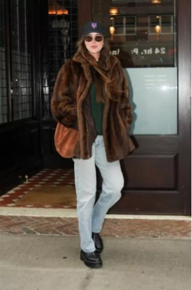 The Row Zipped 1 Leather Ankle Boots worn by Dakota Johnson in New York City on October 14, 2024