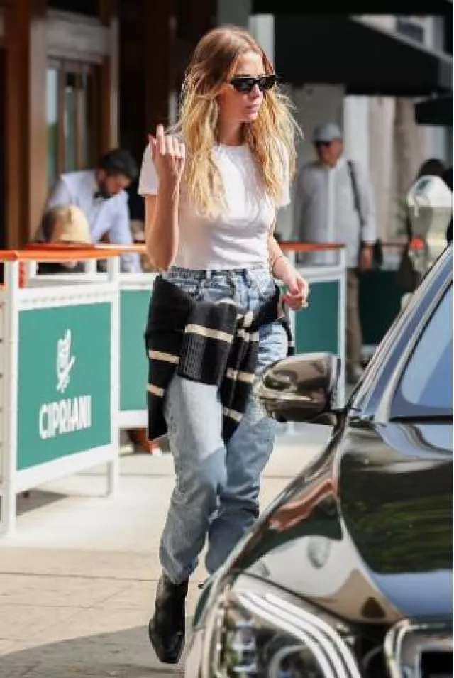 Fanning Stripe Sweater worn by Ashley Benson at Cipriani on October 16, 2024