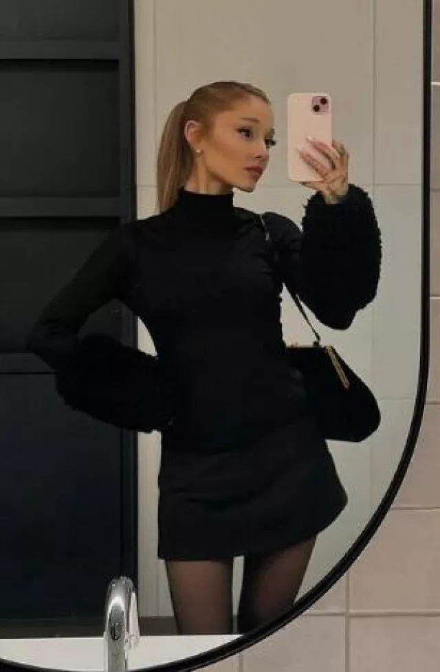 Alaia Faux Fur-Trimmed Wool Turtleneck Top worn by Ariana Grande on her Instagram Post on October 17, 2024