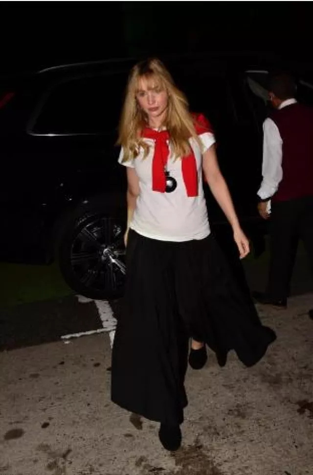 The Row Iri Top in Cashmere worn by Jennifer Lawrence in Los Angeles on October 19, 2024