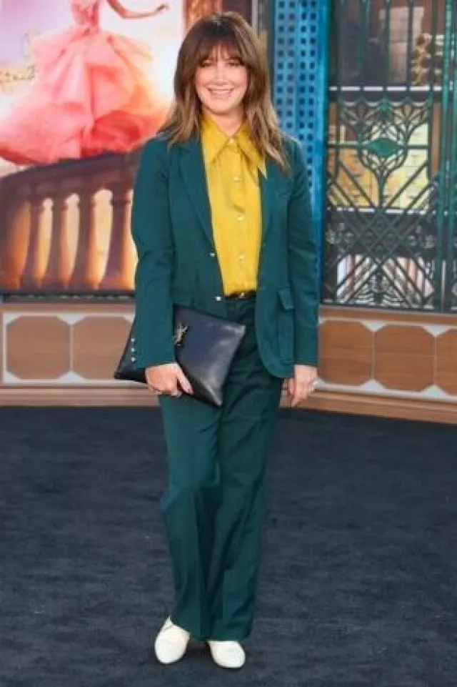 Saint Laurent Large Zipped Pouch worn by Ashley Tisdale at Wicked Premiere on November 9, 2024