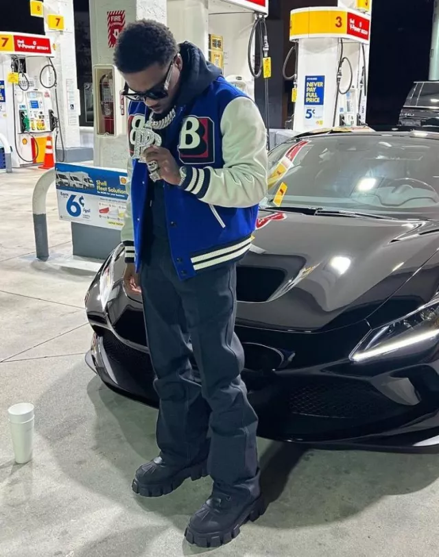 Prada Black Tall Lace Up Monolith Boots worn by Roddy Ricch on the Instagram account @roddyricch