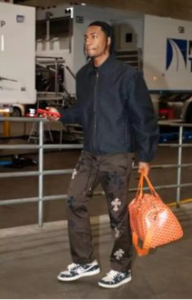 Chrome Hearts Brown Pants with Black & Leopard Cross Patches worn by Rob Dillingham on the Instagram account @timberwolves