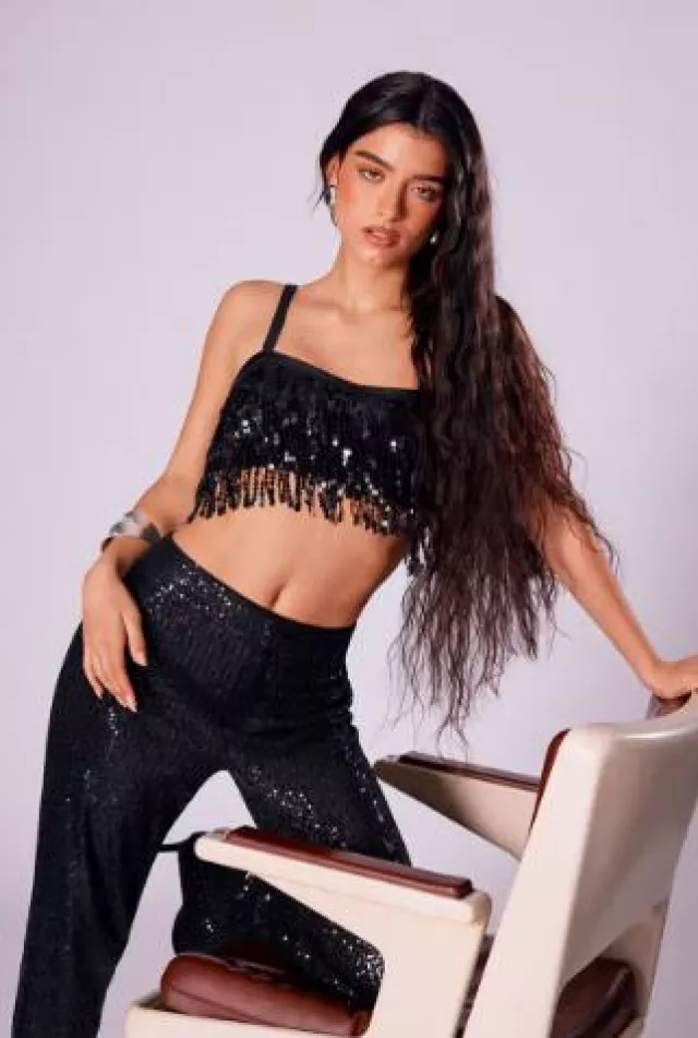 Pull & Bear Wide-Leg Sequined Pants worn by  Dixie D'Amelio at Pull & Bear Holiday Collection on  November 15, 2024