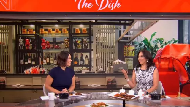 Emporio Armani Mock Neck Ribbed Knit Midi Dress worn by Dana Jacobson as seen in CBS Mornings on November 17, 2024