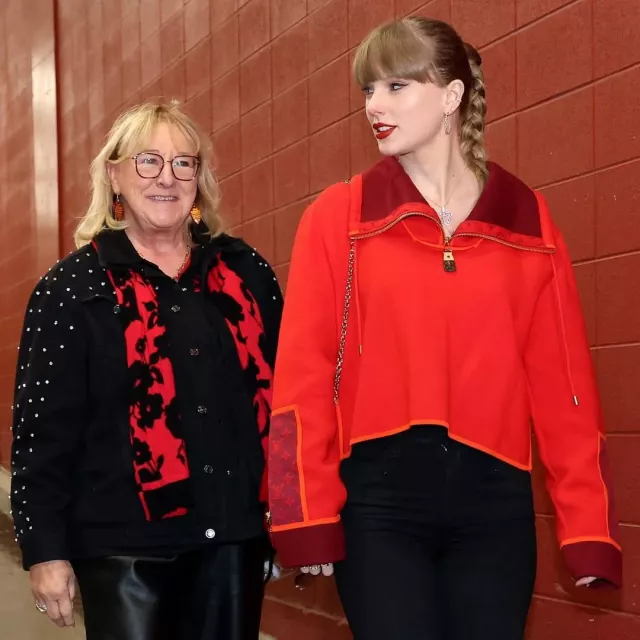 Taylor Swift wears red zip sweater By Louis Vuitton for Chiefs vs Raiders Game  at Arrowhead Stadium in Kansas City, Missouri, on November 29, 2024