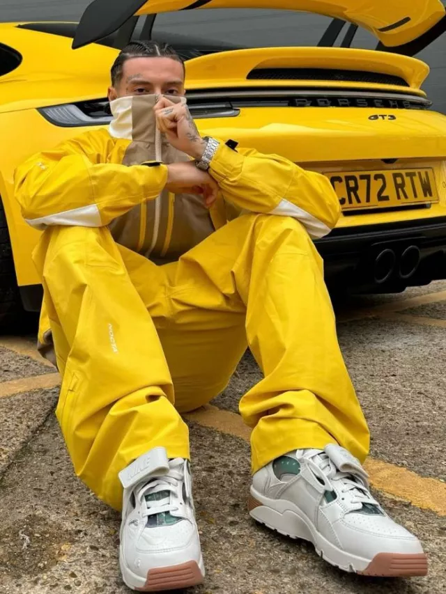 Veste à capuche Nike x Nocta L’Art Biege & Yellow portée par Central Cee sur le compte Instagram @centralcee