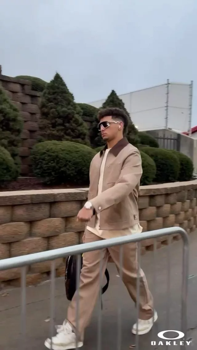 Louis Vuitton Black Eclipse Monogram Discovery MM Backpack worn by Patrick Mahomes II on the Instagram account @chiefs