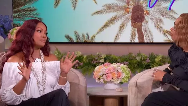 ALC Sienna Pleated Off-The-Shoulder Top worn by Garcelle Beauvais as seen in The Jennifer Hudson Show on November 26, 2024