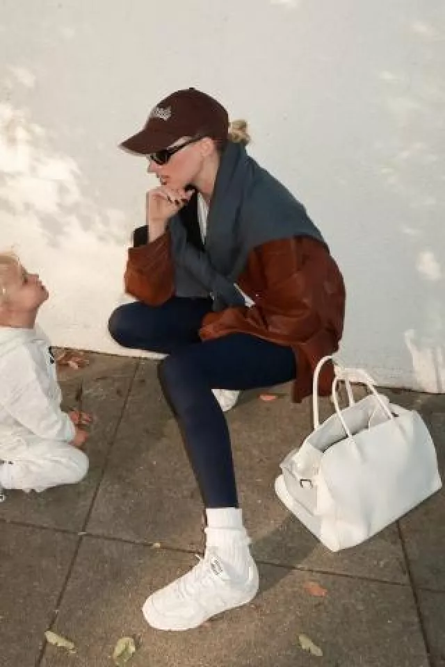 Miu Miu New Balance 530 Sl Suede and Mesh Sneakers worn by Elsa Hosk on her Instagram Post on December 13, 2024