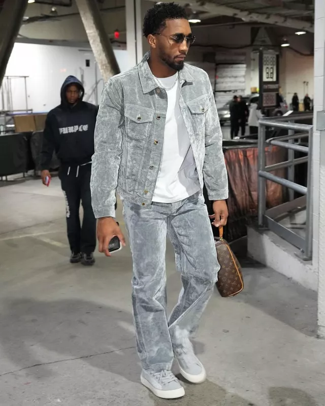 Louis Vuitton Brown Monogram Toiletry Pouch worn by Donovan Mitchell on the Instagram account @nbafashionfits