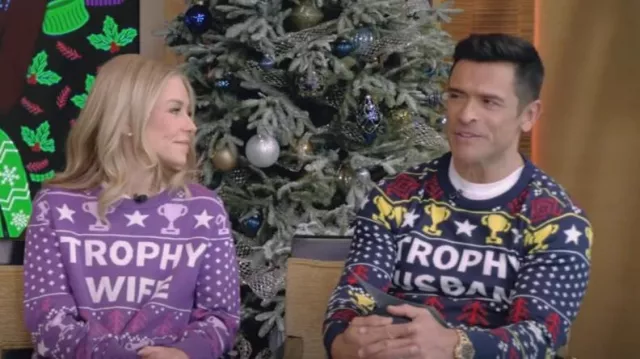 Ugly Christmas Sweater Trophy Wife Christmas Sweater worn by Kelly Ripa as seen in LIVE with Kelly and Mark on December 20, 2024