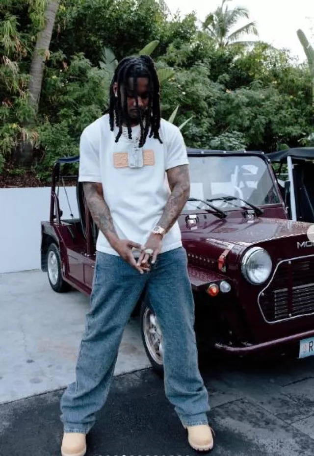 Louis Vuitton White Leather 'LV Lovers' Patch T-Shirt worn by Polo G on the Instagram account @polo.capalot