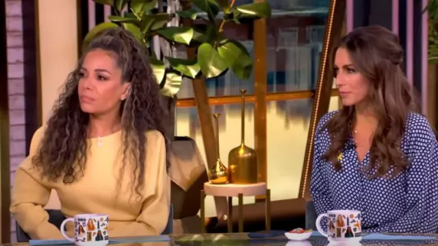 Altuzarra Etta Off-The-Shoulder Knit Maxi Dress worn by Sunny Hostin as seen in The View on January 7, 2025