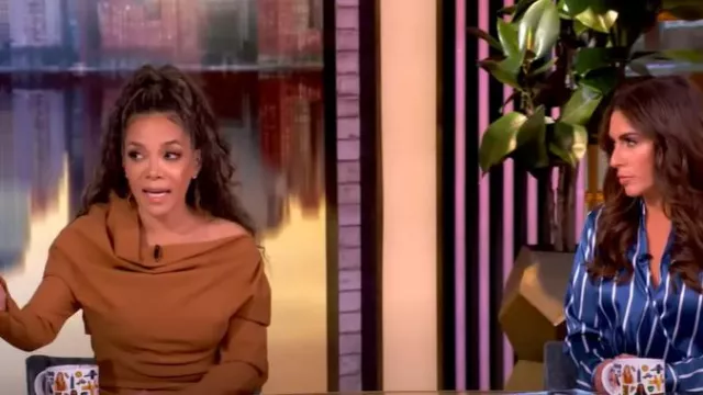 A.W.A.K.E. Mode Draped One Shoulder Top worn by Sunny Hostin as seen in The View on February 4, 2025