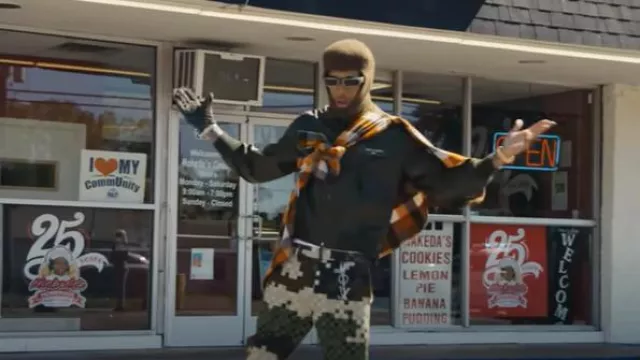 Chemise en flanelle à carreaux orange portée par NLE Choppa dans CAN WE LIVE ? (feat. B.O.A. Mook)